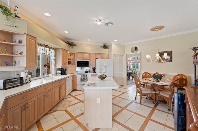 kitchen featuring a kitchen island, white appliances, light tile patterned floors, tasteful backsplash, and sink