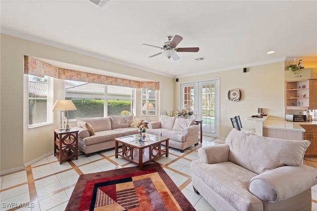 tiled living room featuring ornamental molding and ceiling fan