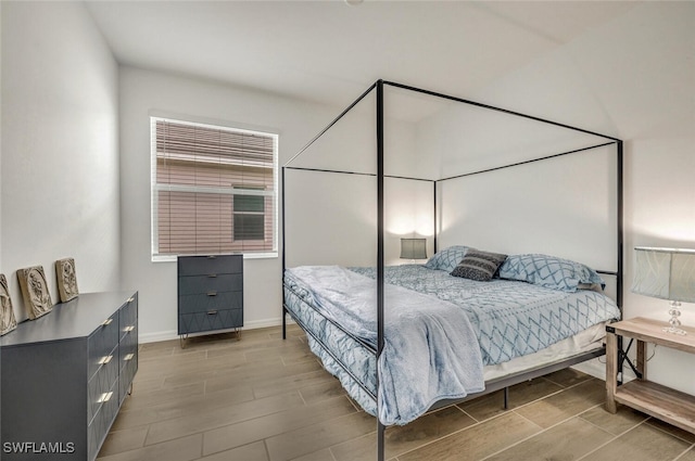 bedroom featuring hardwood / wood-style floors