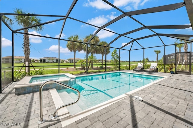 view of swimming pool with a lanai, a patio area, and a yard