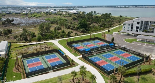 birds eye view of property featuring a water view