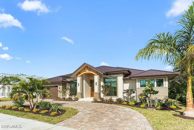 view of front of home featuring a garage