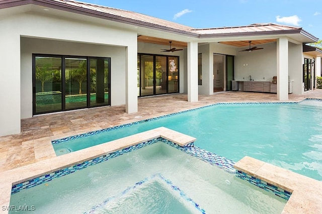 view of pool featuring ceiling fan and a patio