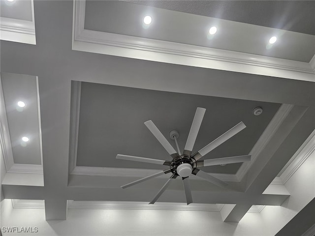 room details with coffered ceiling, ceiling fan, and crown molding