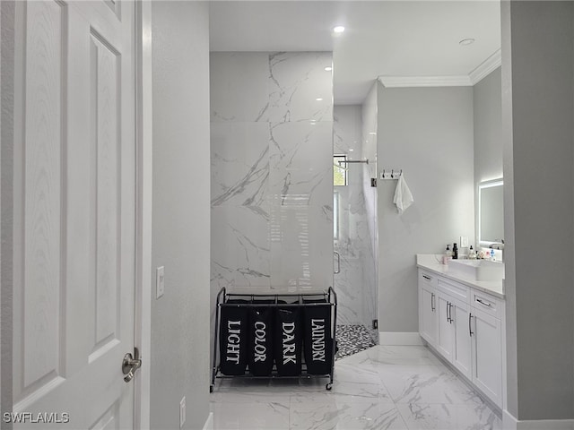 bathroom featuring a tile shower, ornamental molding, and vanity