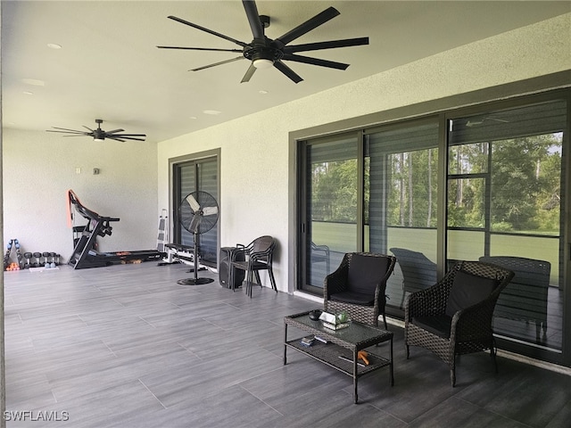 wooden deck featuring ceiling fan