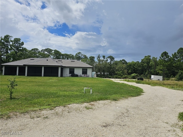 view of front of house with a front lawn