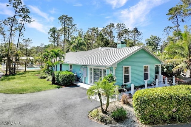 exterior space with a front lawn