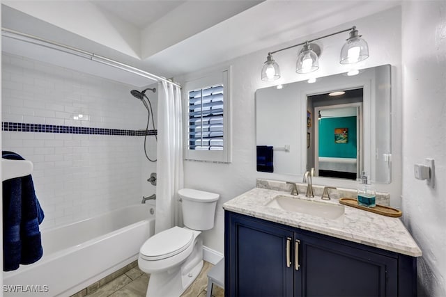 full bathroom featuring vanity, toilet, and shower / bath combination with curtain