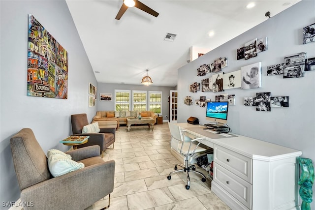 home office featuring ceiling fan and vaulted ceiling