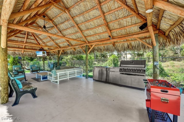 view of patio featuring a gazebo, grilling area, and area for grilling