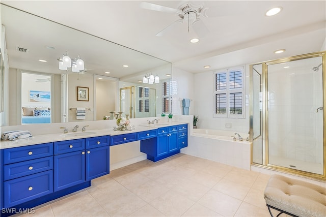 bathroom with vanity, independent shower and bath, tile patterned floors, and ceiling fan