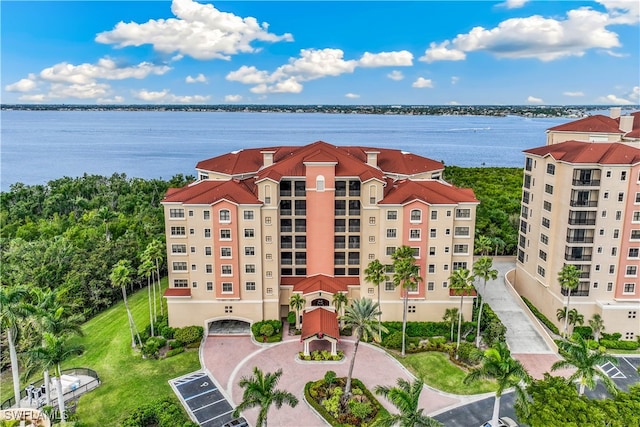 birds eye view of property featuring a water view