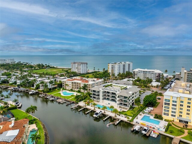 birds eye view of property featuring a water view