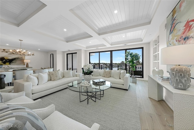 living room featuring a notable chandelier, recessed lighting, light wood-style flooring, coffered ceiling, and beamed ceiling