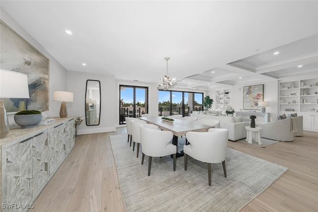 dining area featuring recessed lighting, light wood-type flooring, built in shelves, and a notable chandelier