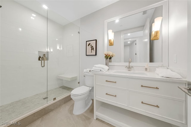 bathroom with visible vents, toilet, a shower stall, vanity, and tile patterned floors