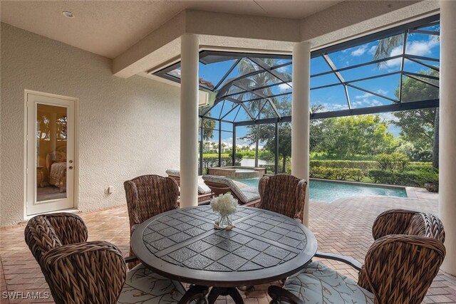 sunroom / solarium with a pool