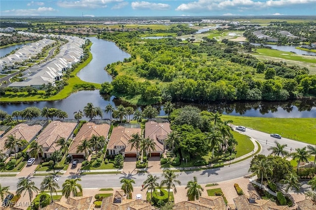 aerial view featuring a residential view and a water view