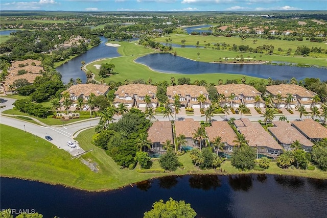 birds eye view of property with a residential view and a water view