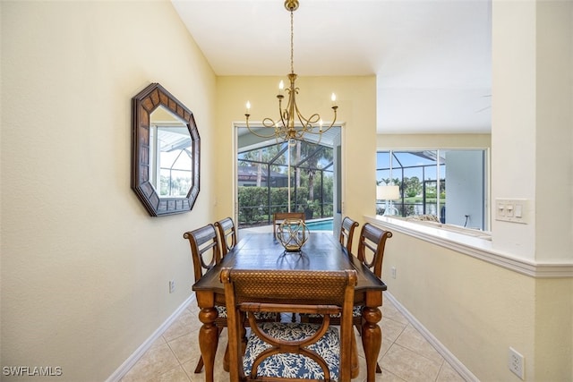 dining room featuring light tile patterned floors and an inviting chandelier