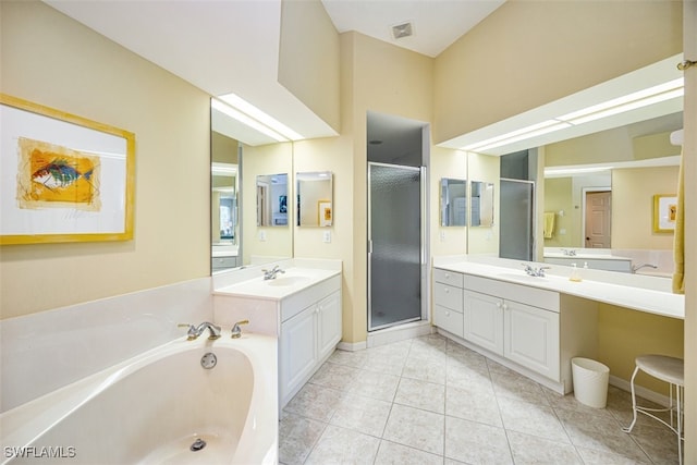 bathroom featuring tile patterned floors, vanity, and separate shower and tub