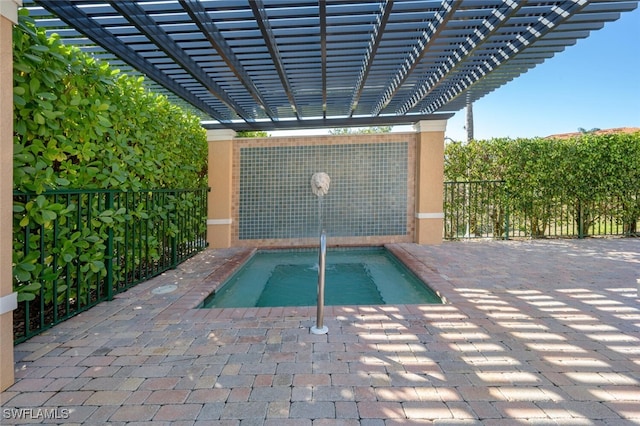 view of pool featuring a pergola and a patio