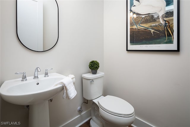 bathroom featuring toilet