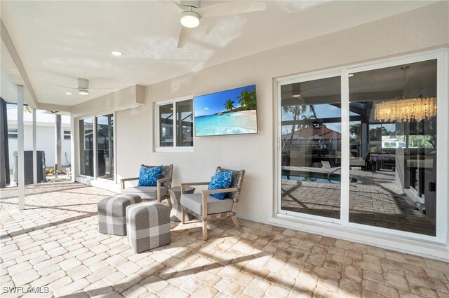 view of patio with ceiling fan