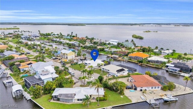 bird's eye view with a water view