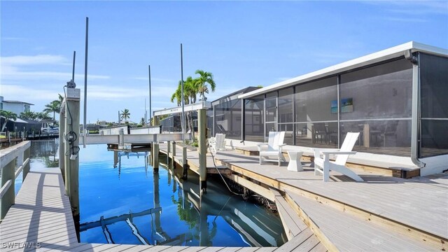 dock area featuring a water view