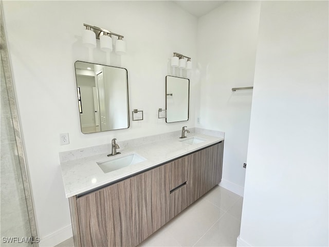 bathroom featuring tile patterned floors and vanity