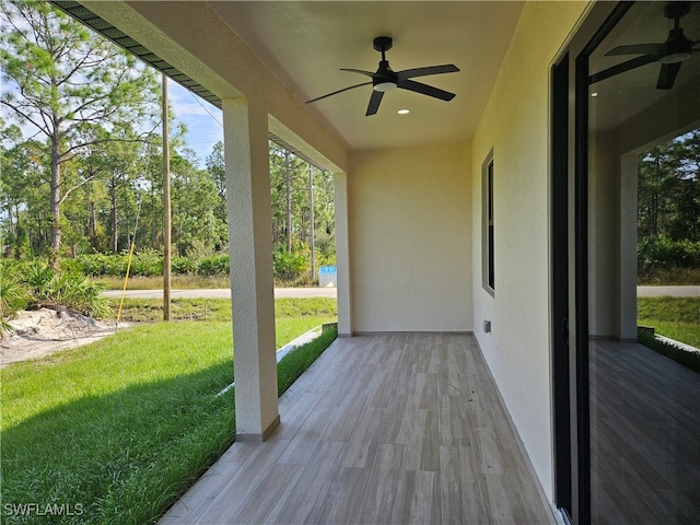 view of patio with ceiling fan