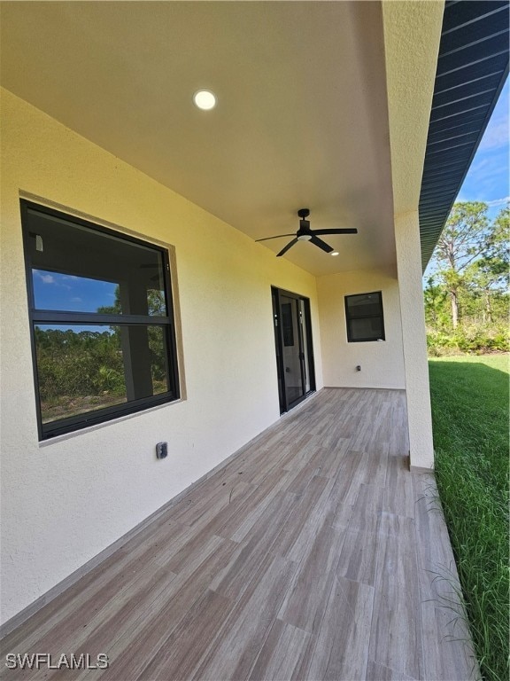 view of patio with ceiling fan