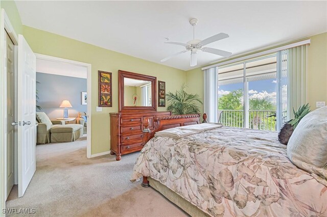 carpeted bedroom featuring access to exterior and ceiling fan