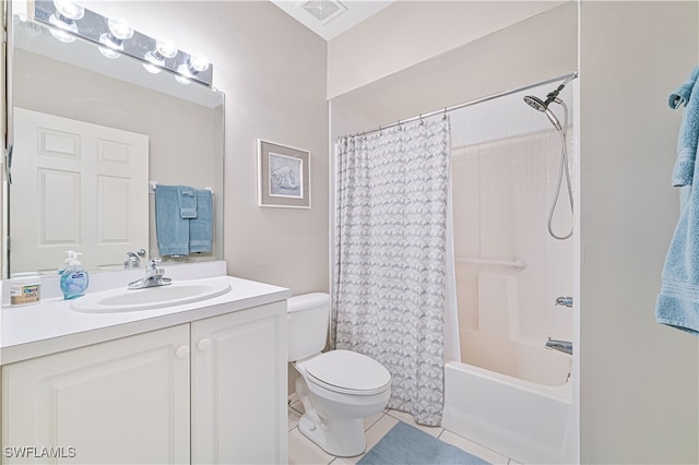 full bathroom featuring tile patterned flooring, toilet, shower / tub combo with curtain, and vanity