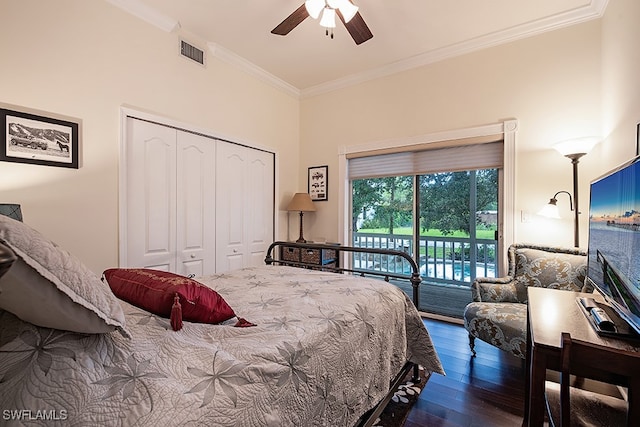 bedroom with dark hardwood / wood-style flooring, access to outside, ceiling fan, and a closet