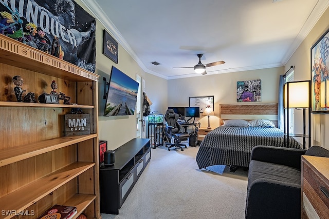 bedroom featuring ceiling fan, crown molding, and light carpet