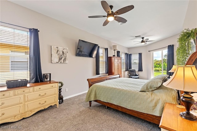 bedroom with ceiling fan and light colored carpet