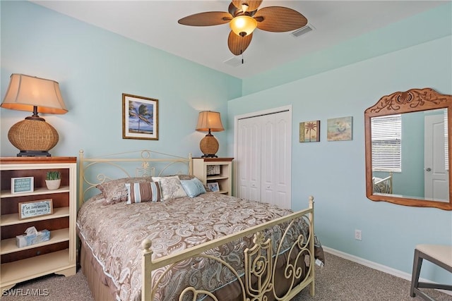 carpeted bedroom featuring ceiling fan and a closet