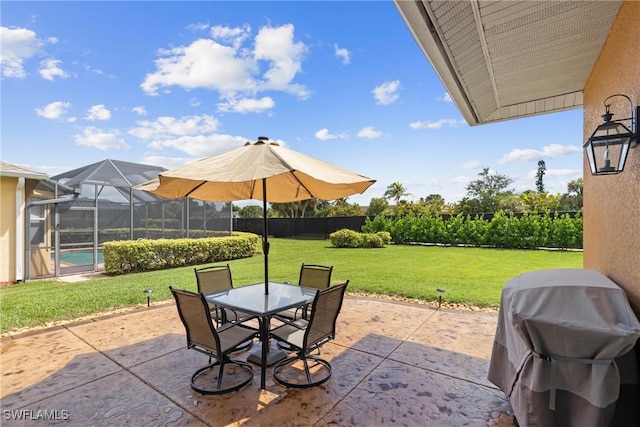 view of patio featuring a lanai and grilling area