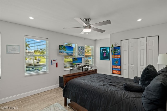 bedroom featuring baseboards, ceiling fan, light wood-style flooring, and recessed lighting