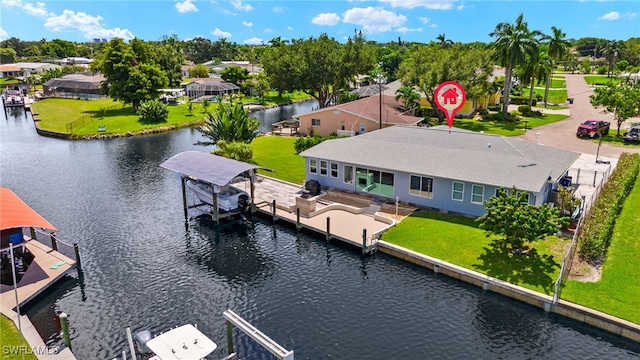 drone / aerial view with a water view