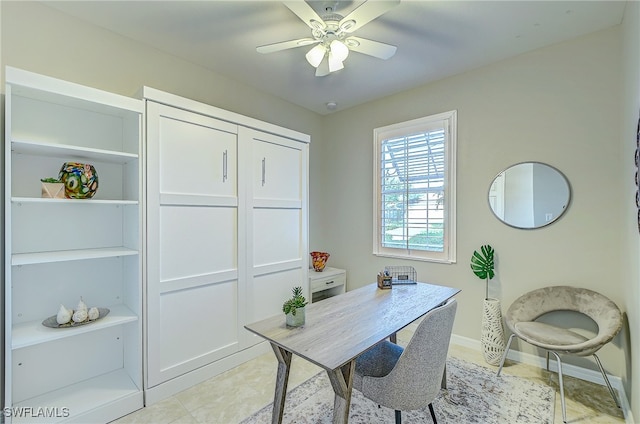 office area with ceiling fan and light tile patterned floors