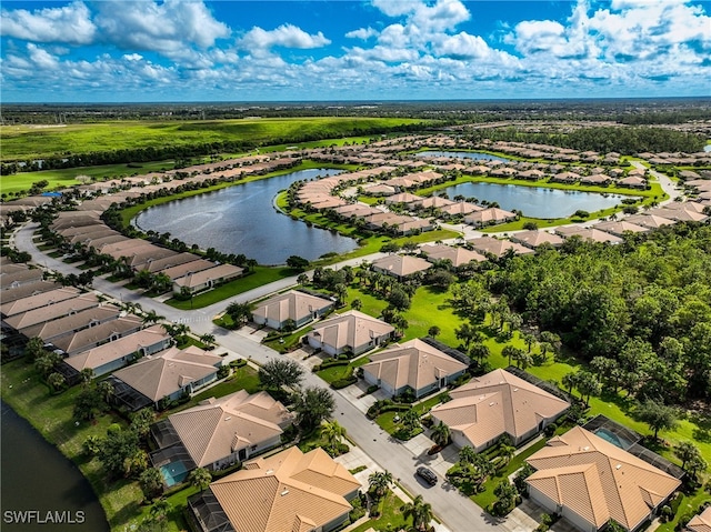 drone / aerial view featuring a water view