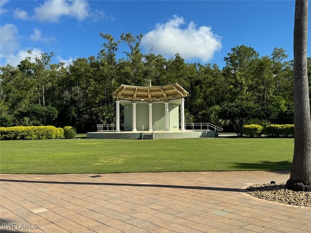 view of community featuring a yard