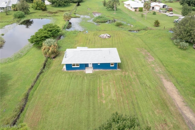 bird's eye view featuring a water view and a rural view