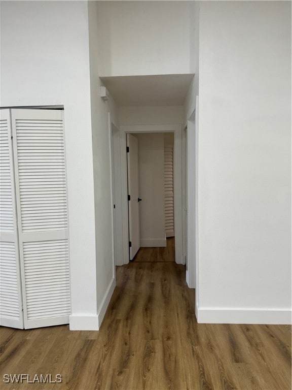 corridor featuring hardwood / wood-style flooring