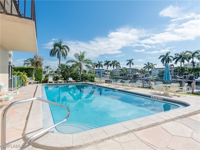 view of pool featuring a patio