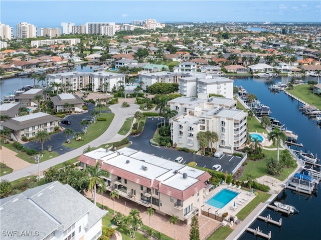 birds eye view of property featuring a water view